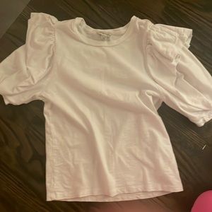 A white ruffled sleeve shirt